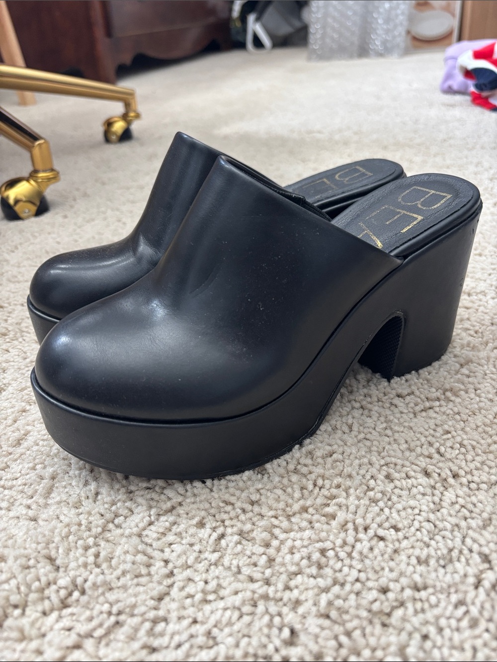 Black platform clogs